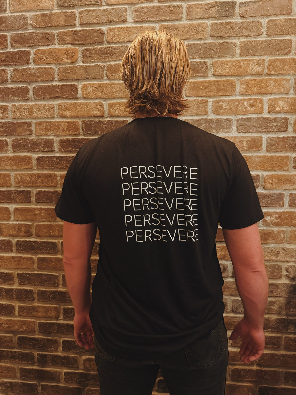 Never Give In - Adult Organic Bamboo Tee, black, worn