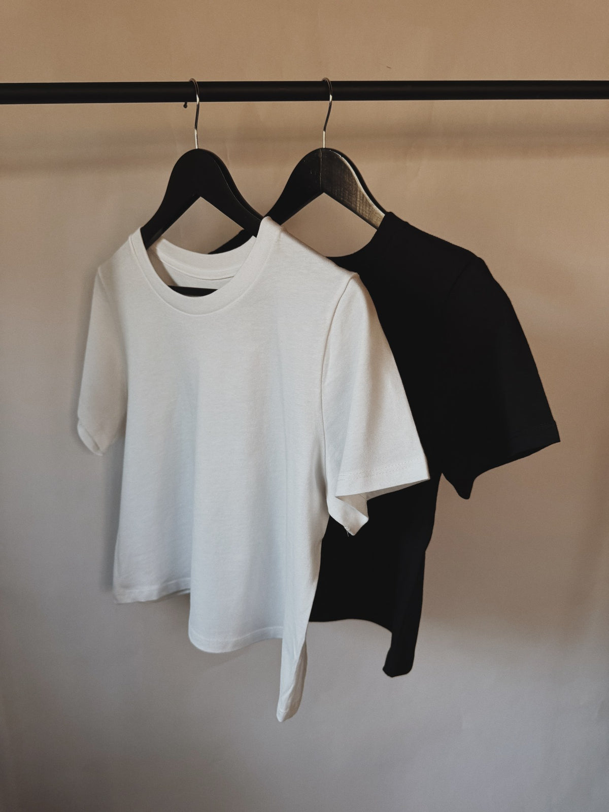 The Sparrow - Women's Modern Fit Tee, on the rail