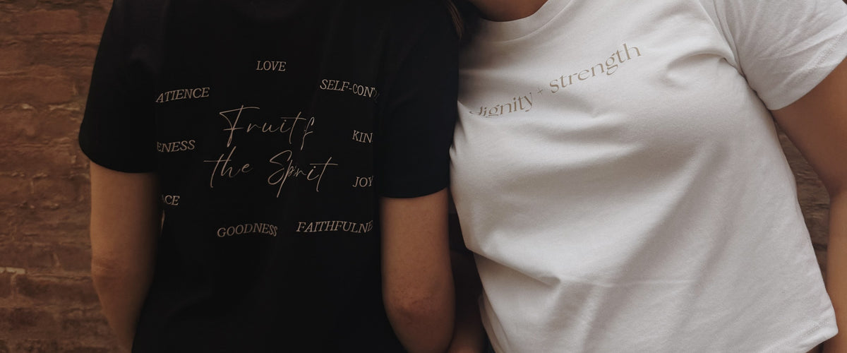 Two women in Bee and Lion tees, side by side